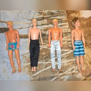 Barbie Ken Doll Lot with Blue, Black, Silver and Teal Swimwear